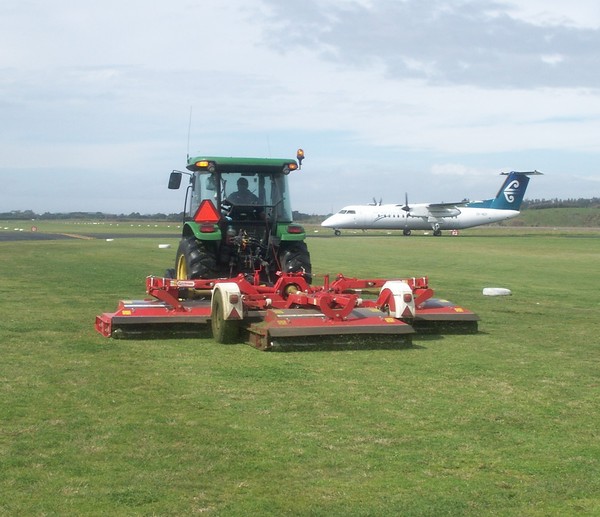 The Trimax Pegasus S2  4.93 metre model mowing Airport runways at Tauranga, New Zealand.